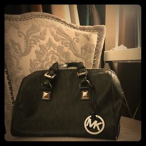 Used Michael Kors black purse w/silver hardware$20